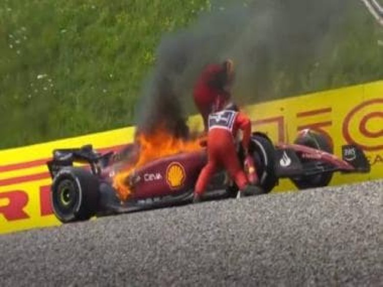 Watch: Carlos Sainz's Ferrari catches fire during Austrian GP as Spanish driver jumps out of car