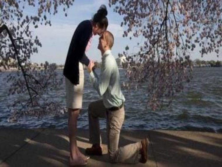 Watch: Woman falls three times while filming sister's proposal