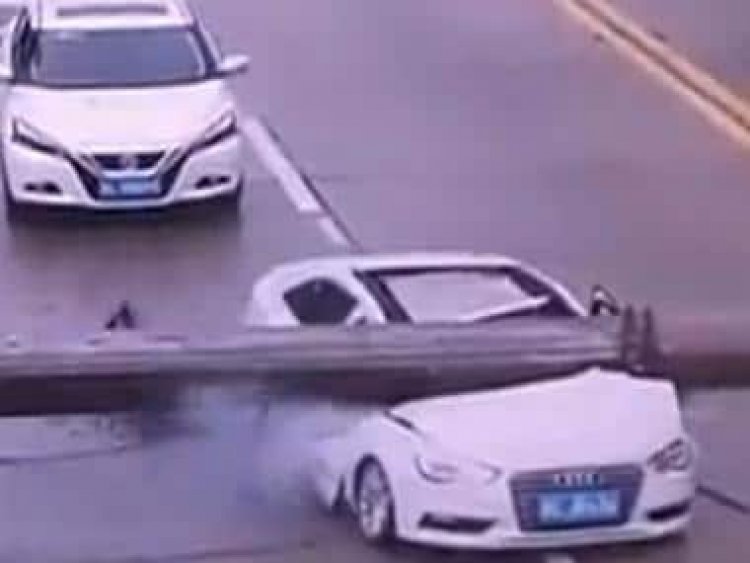 Watch: Man miraculously escapes pole falling on Audi