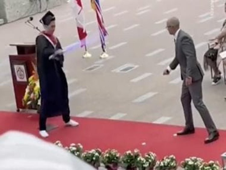 Watch: Student surprises principal with lightsaber during graduation ceremony