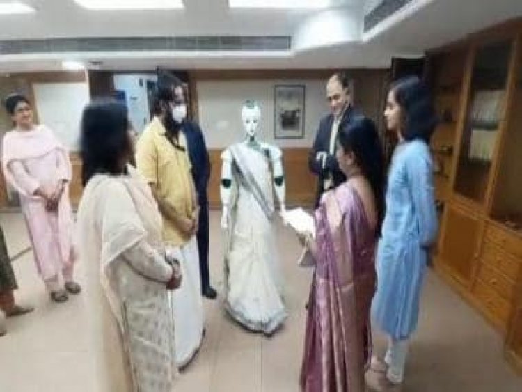 Watch: Robot dressed in saree accepts loan document from bank branch