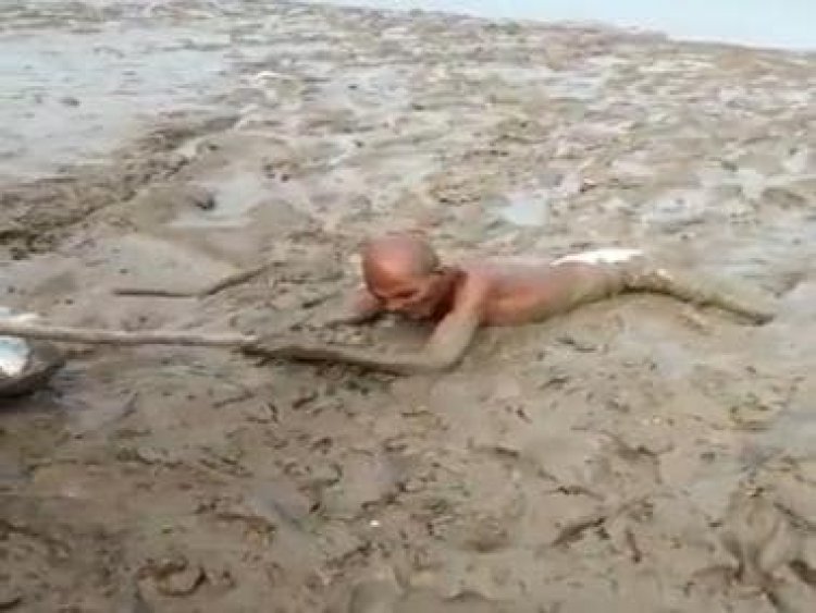 WATCH: Elderly man almost drowns trapped in swampy mud on banks of Ken river in UP's Hamirpur