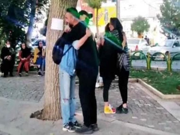 Iranian couple break law by hugging people in street since men, women forbidden from mixing from age 7