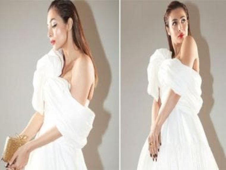 Malaika Arora channels her inner goddess in all-white look paired with scarlet red lips