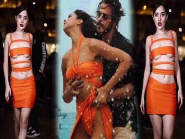 Watch: Uorfi Javed hits back at 'Besharam Rang' trolls, grooves on track in orange cutout dress