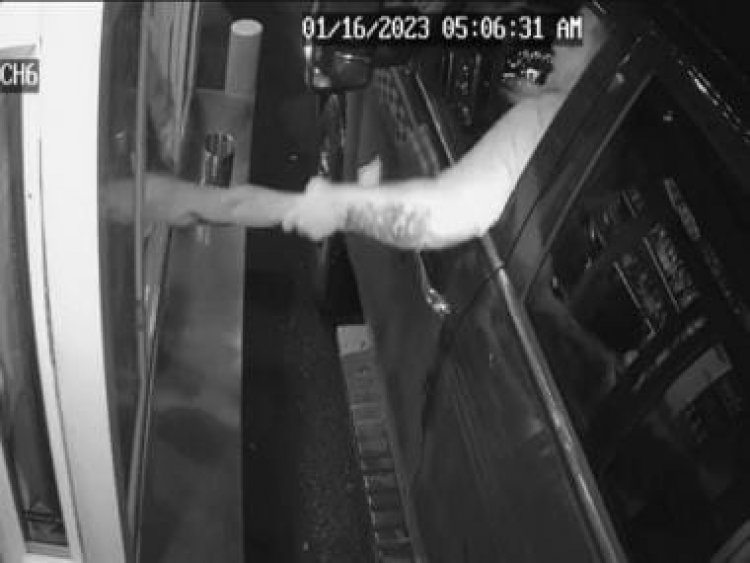 Watch: Man attempts to pull barista out of drive-through window; arrested