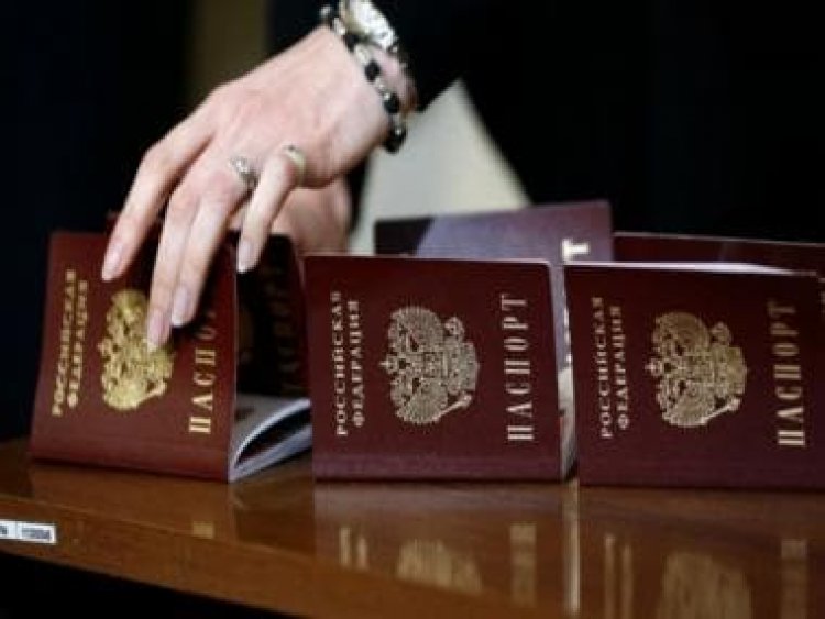 Amid fears of fleeing, Russian officials asked to surrender passports