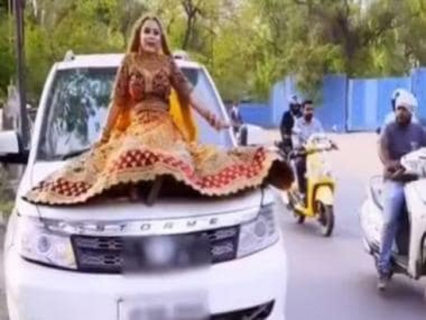 UP bride fined over Rs 15,000 for riding on top of a moving SUV; video goes viral