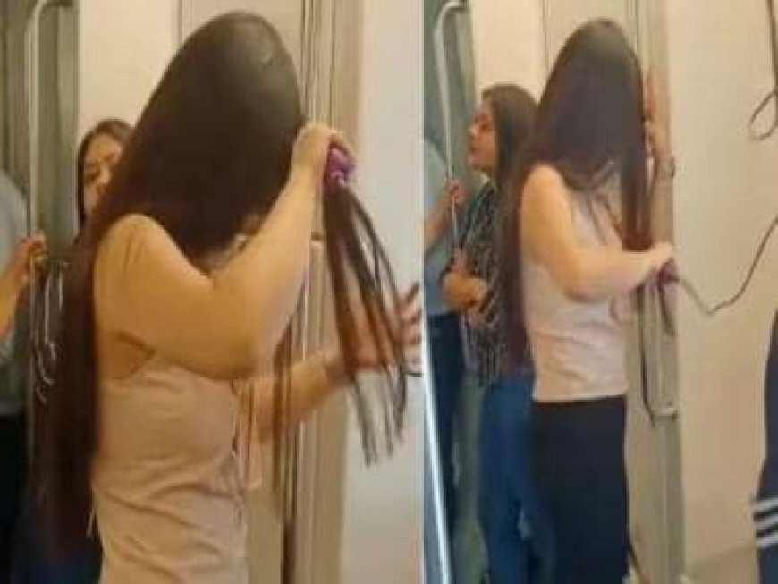 'From bedroom to dressing table': Woman spotted using hair straightener inside Delhi metro