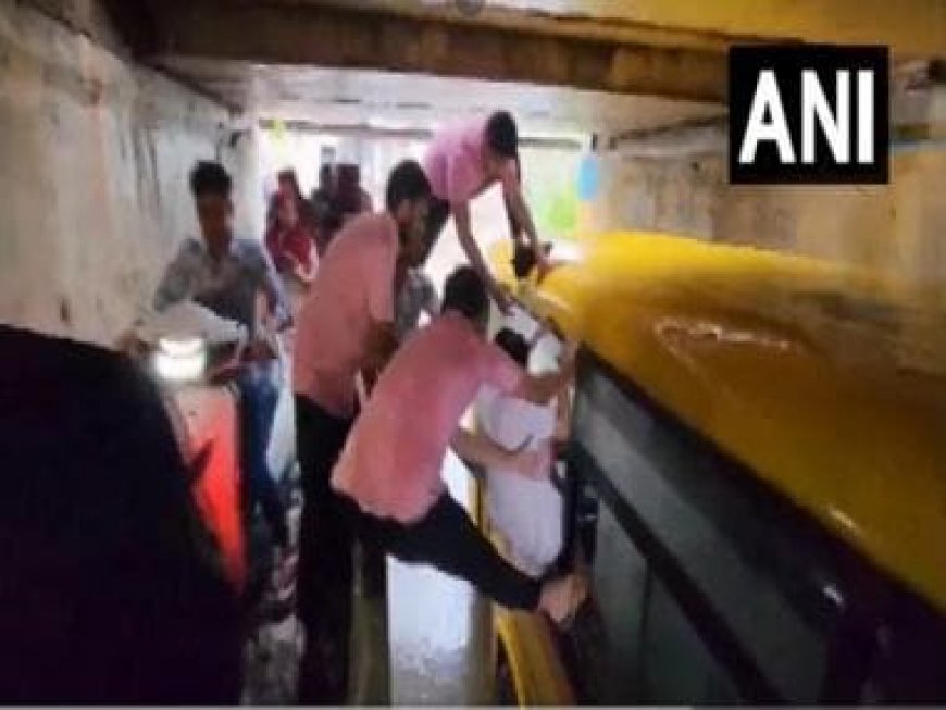 WATCH: Gujarat locals rescue students after bus gets stuck in waterlogged underpass