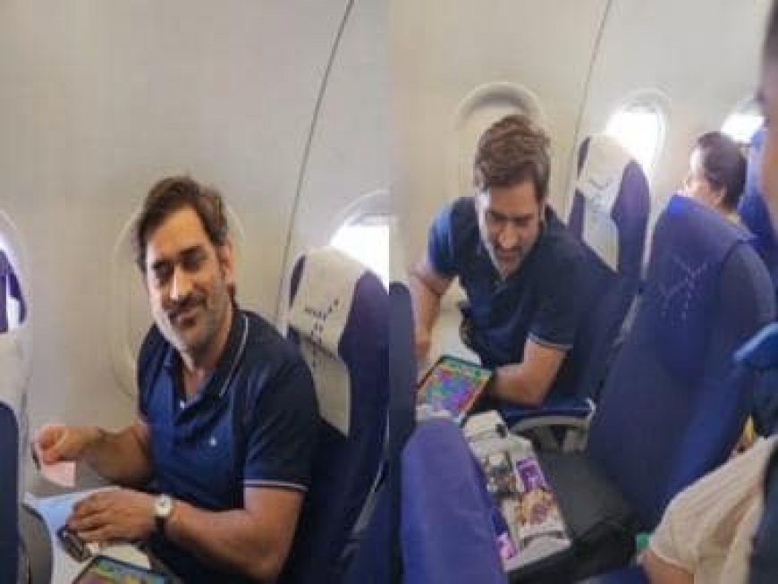 Watch: MS Dhoni plays Candy Crush as air hostess offers him chocolates