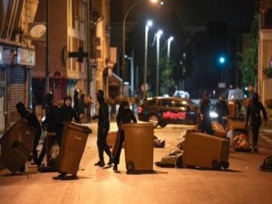 Sporadic violence, but calmer night in France after family buries teenager