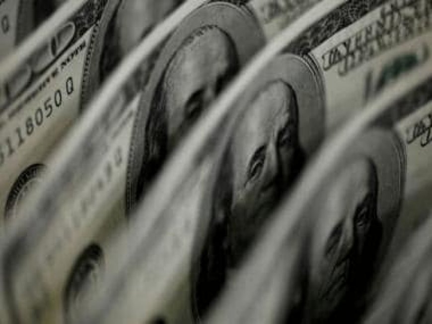 Dollar firms as Fed minutes fuel rate hike views, yen gains