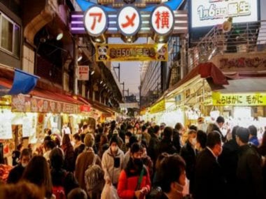 Japan's population falls while foreign residents rise to record