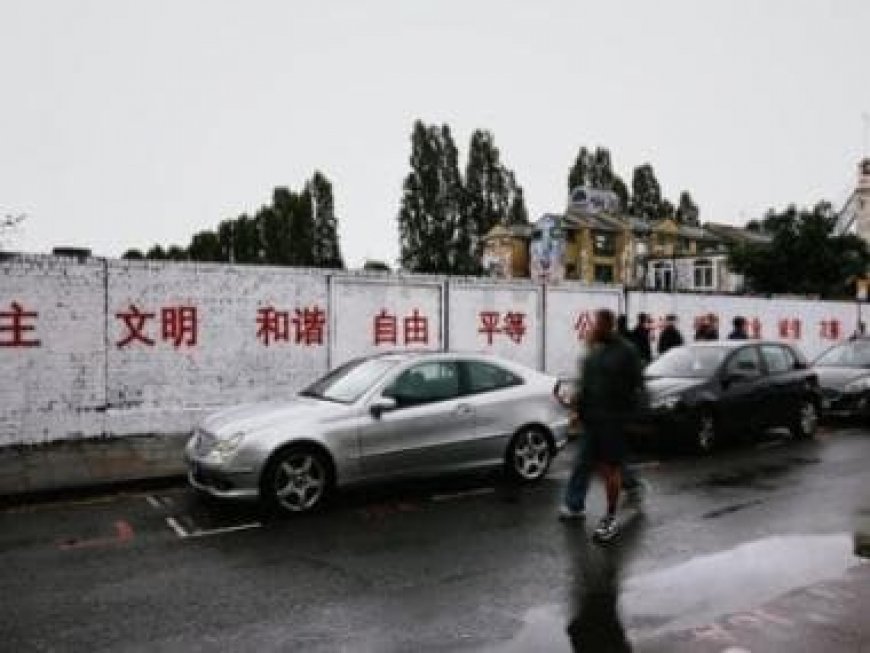 Graffiti war: Chinese political slogans appear on London's Brick Lane
