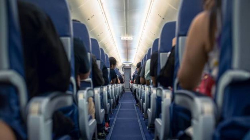Airline travelers react as men fly first class with wives in coach