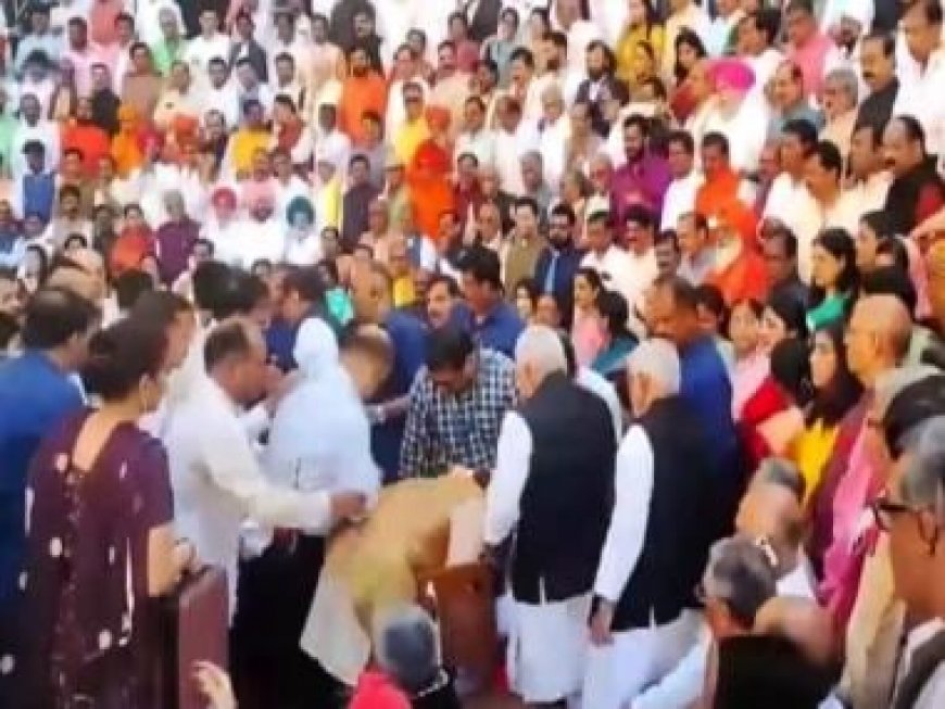 Watch: BJP MP Narhari Amin faints during group photo session in old Parliament building