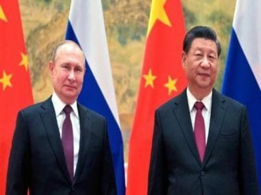 Russia's Vladimir Putin arrives in Beijing to meet 'dear friend' Xi Jinping