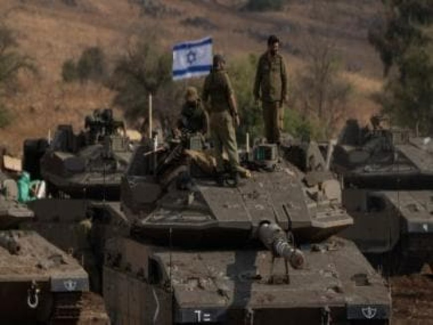 Israel deploys hundreds of tanks, soldiers close to Gaza fence as ground offensive looms
