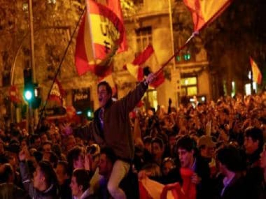 WATCH: Protesters clash with police over Spanish PM's quid-pro-quo deal with Catalan separatists