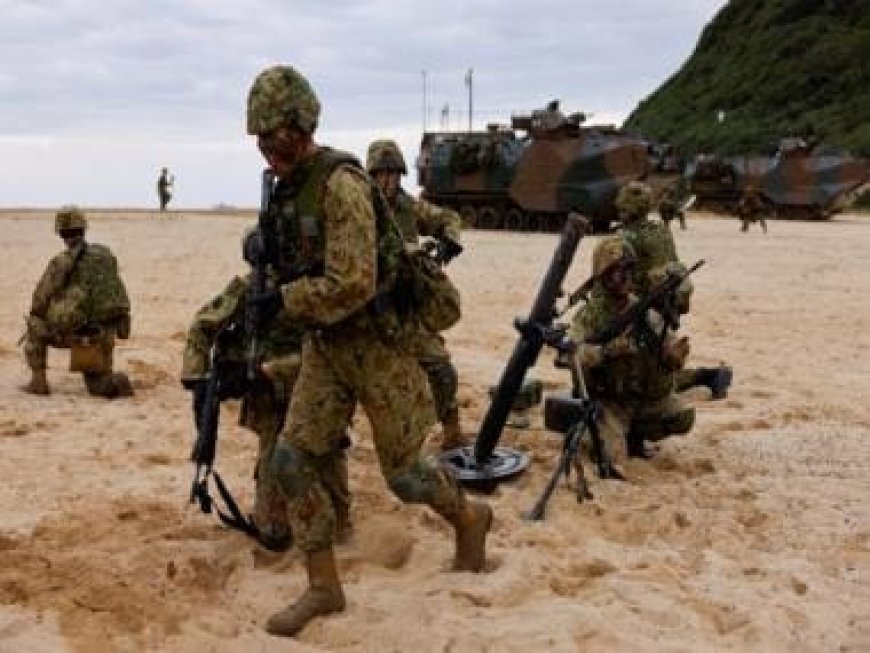 Japanese troops drill on island seen as vulnerable to China