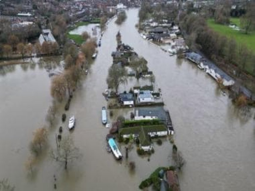 UK hit by flooding after heavy rain swells major rivers